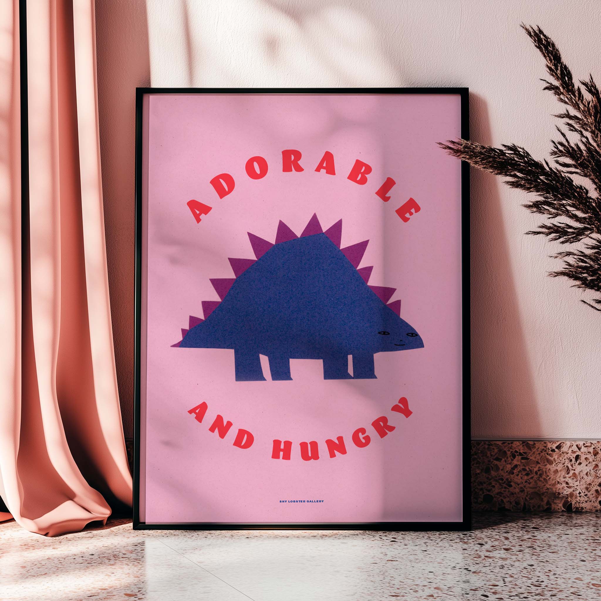 "Adorable and Hungry" – Cute purple dinosaur illustration on a bright pink background, crafted with paper cutouts. A fun, colorful print for kids' spaces, inspiring creativity and joy.
