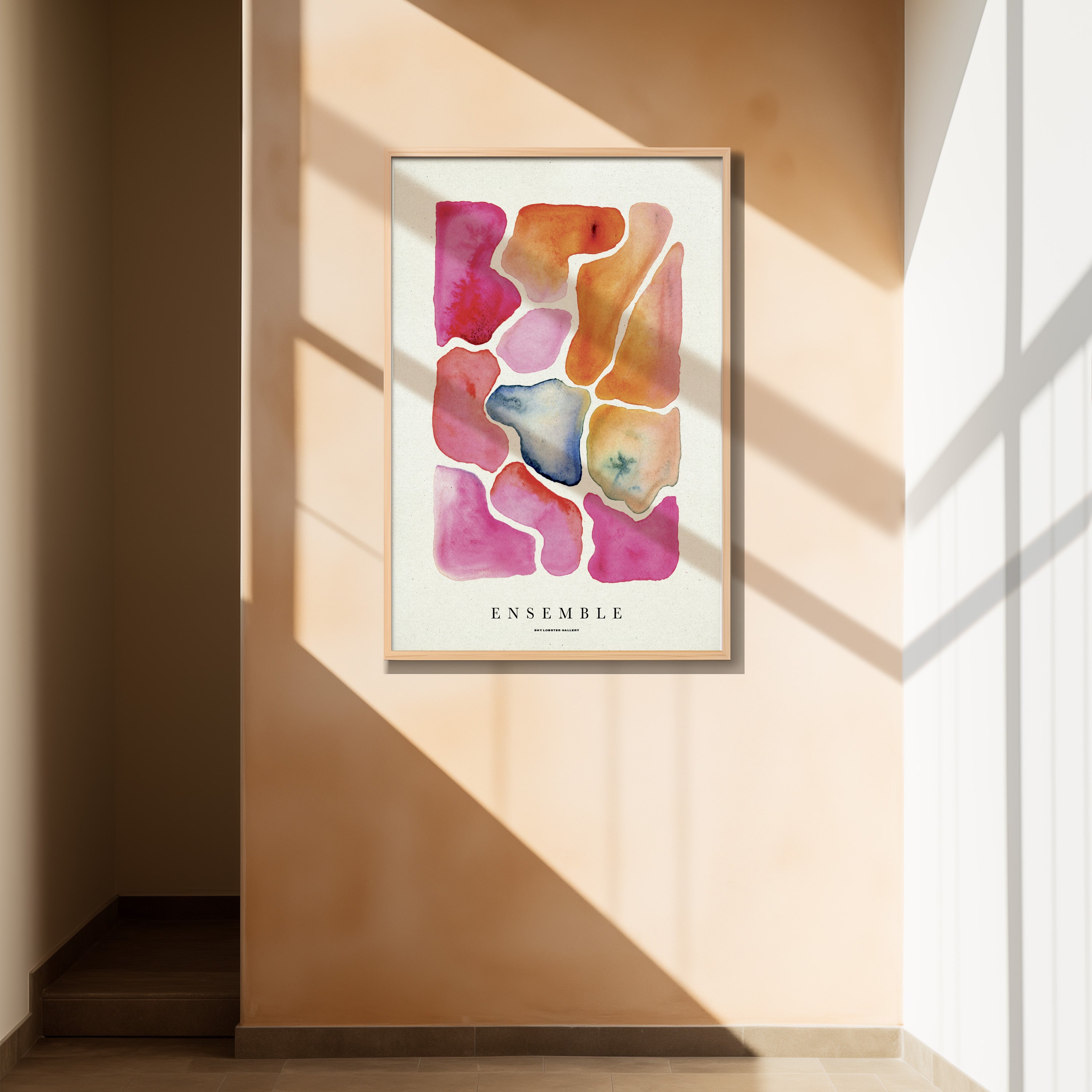 "Ensemble" – Vibrant watercolor poster showcasing interconnected shapes in soothing pink, orange, and blue tones, celebrating the power of unity and connection.
