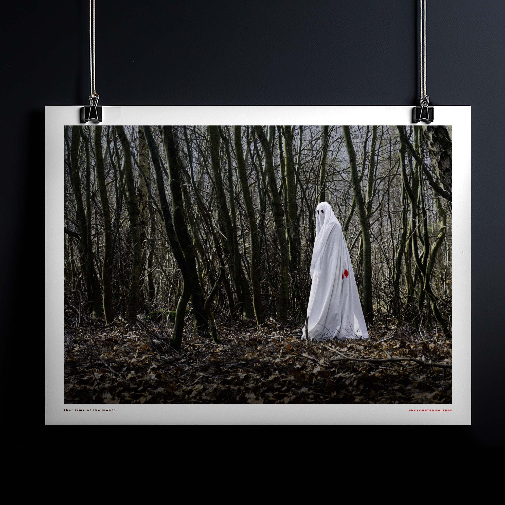 "Ghost - That Time of the Month" – Humorous feminist graphic poster featuring a ghost on its period, with blood on a white sheet. A bold and playful print celebrating femininity and natural aspects of womanhood, perfect for unique and creative home or office decor.
