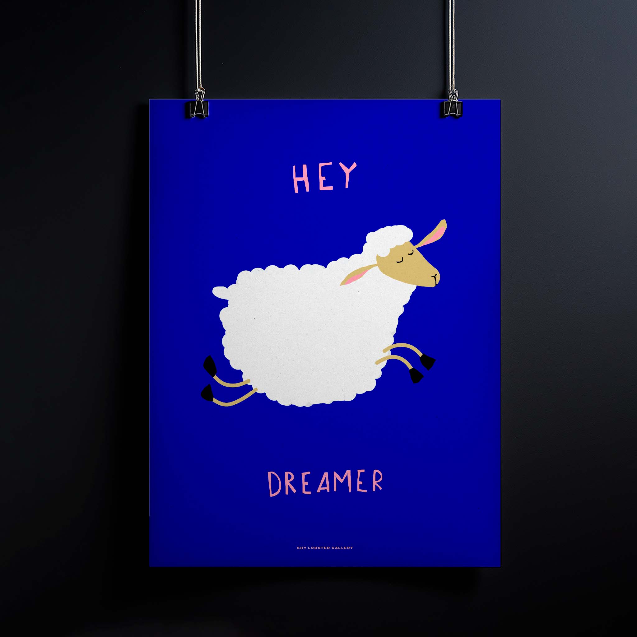 "Hey Dreamer" kids poster featuring a playful sheep leaping against a starry blue night sky, designed to inspire relaxation and sweet dreams in nurseries or bedrooms.
