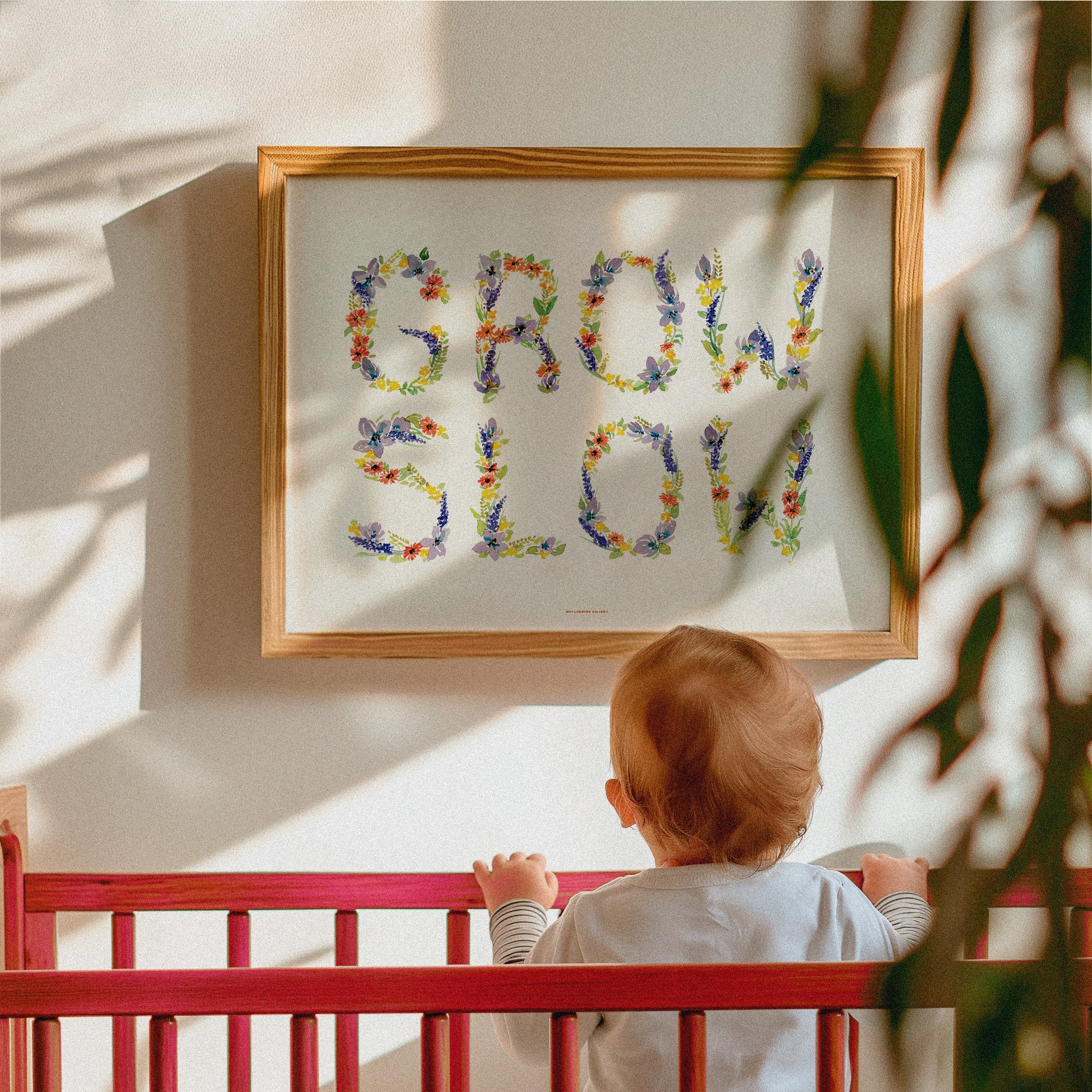 eautiful "GROW SLOW" kids poster with delicate watercolor flowers, promoting a calm and thoughtful approach to childhood, ideal for a nursery or playroom decor.
